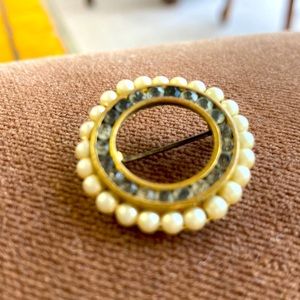 Old patina brass faux Pearl circle pin.